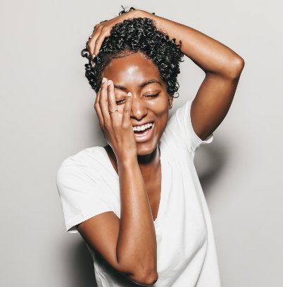 Woman hands on face with white shirt