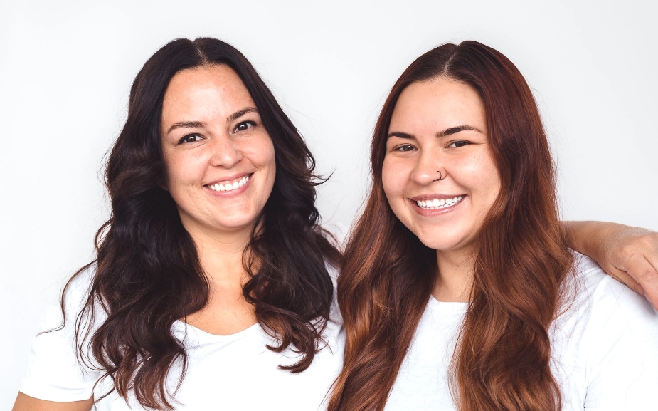 Two women smiling