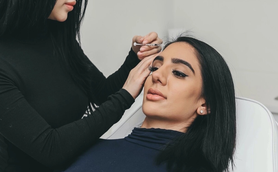 Woman doing cosmetic injection