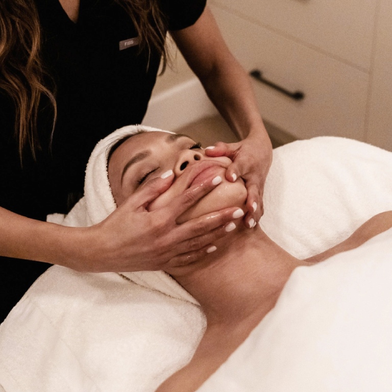 Woman doing facil treatment clinic room