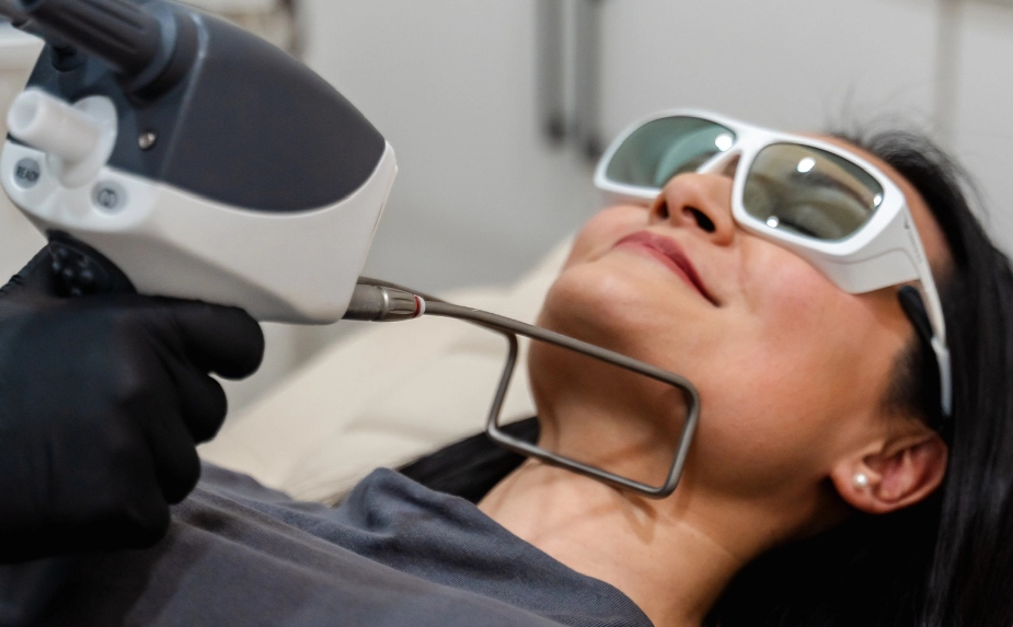 Woman doing laser treatment at clinic