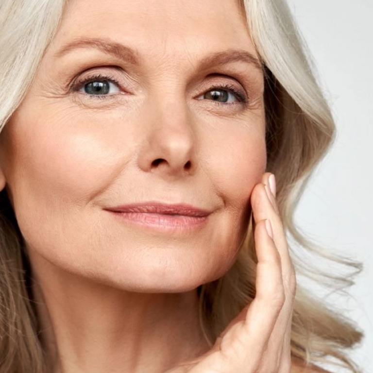 Woman doing skin treatment at clinic