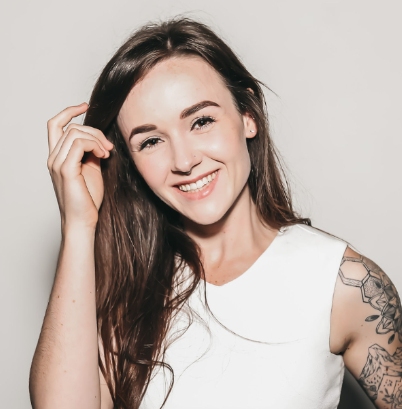 Woman long hair white shirt smiling