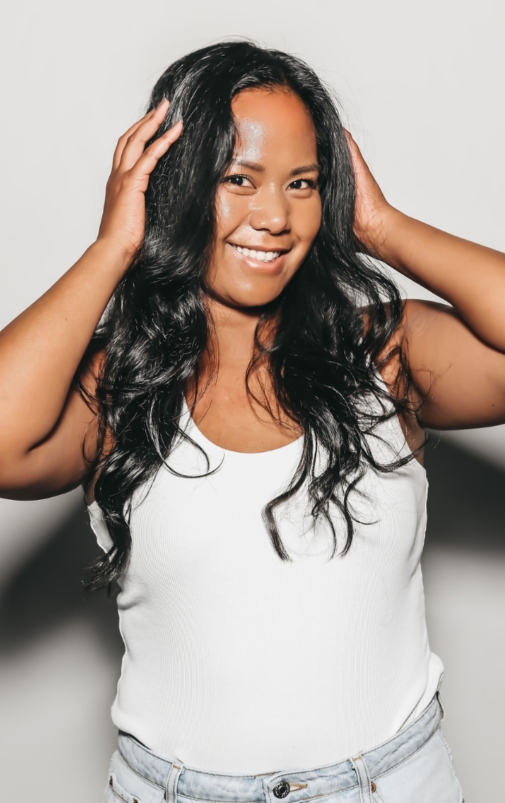 Woman white shirt and jeans and long black hair