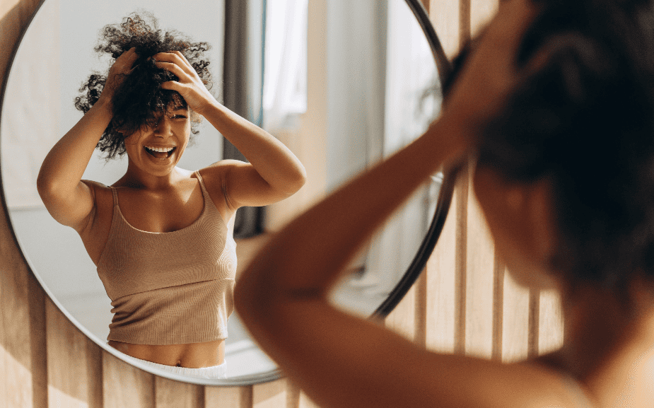 Woman smiling in mirror